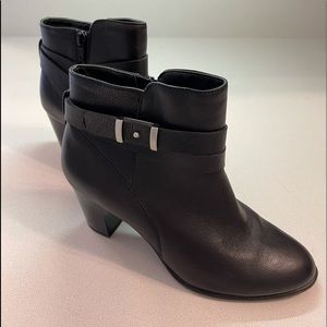 Black leather heeled ankle boots